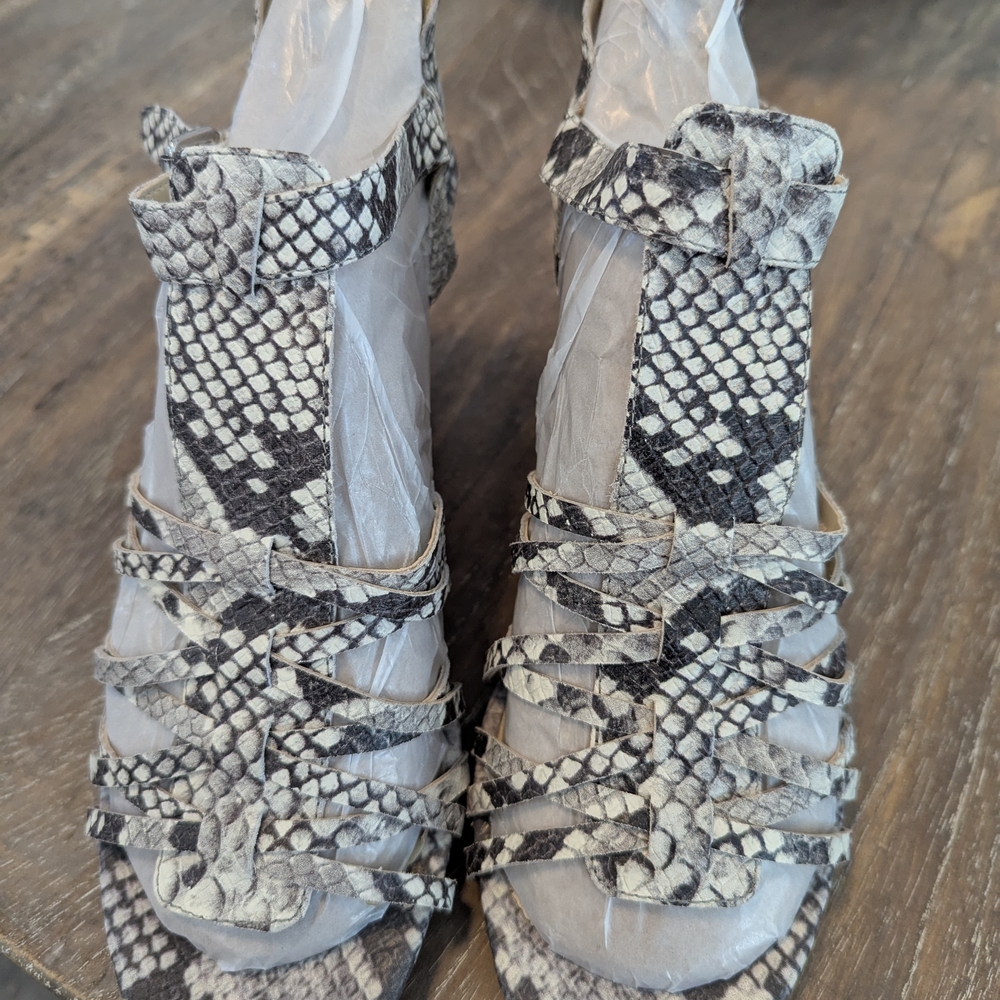 Isaac Mizrahi Black and White Sandals with Modern Silhouette